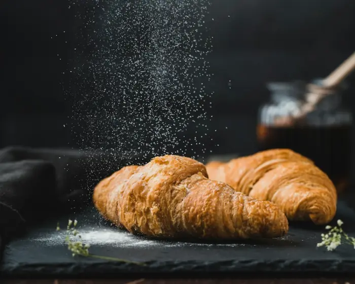 A golden croissant with crisp, flaky layers